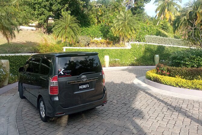 Round Trip St. Lucia Private Airport Transfers - UVF - Inside the ride: AC comfort and the kind of driver you want